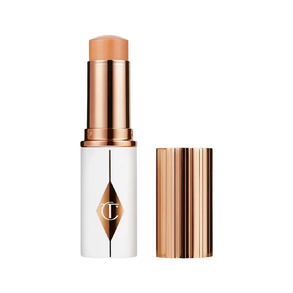 CHARLOTTE TILBURY - UNREAL SKIN SHEER GLOW TINT HYDRATING FOUNDATION STICK 9G